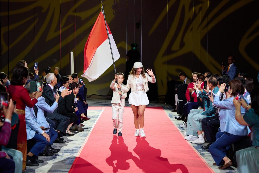 Chiara e Eugenio Petrulli porta bandiera di Monaco per AMC HauteCouture